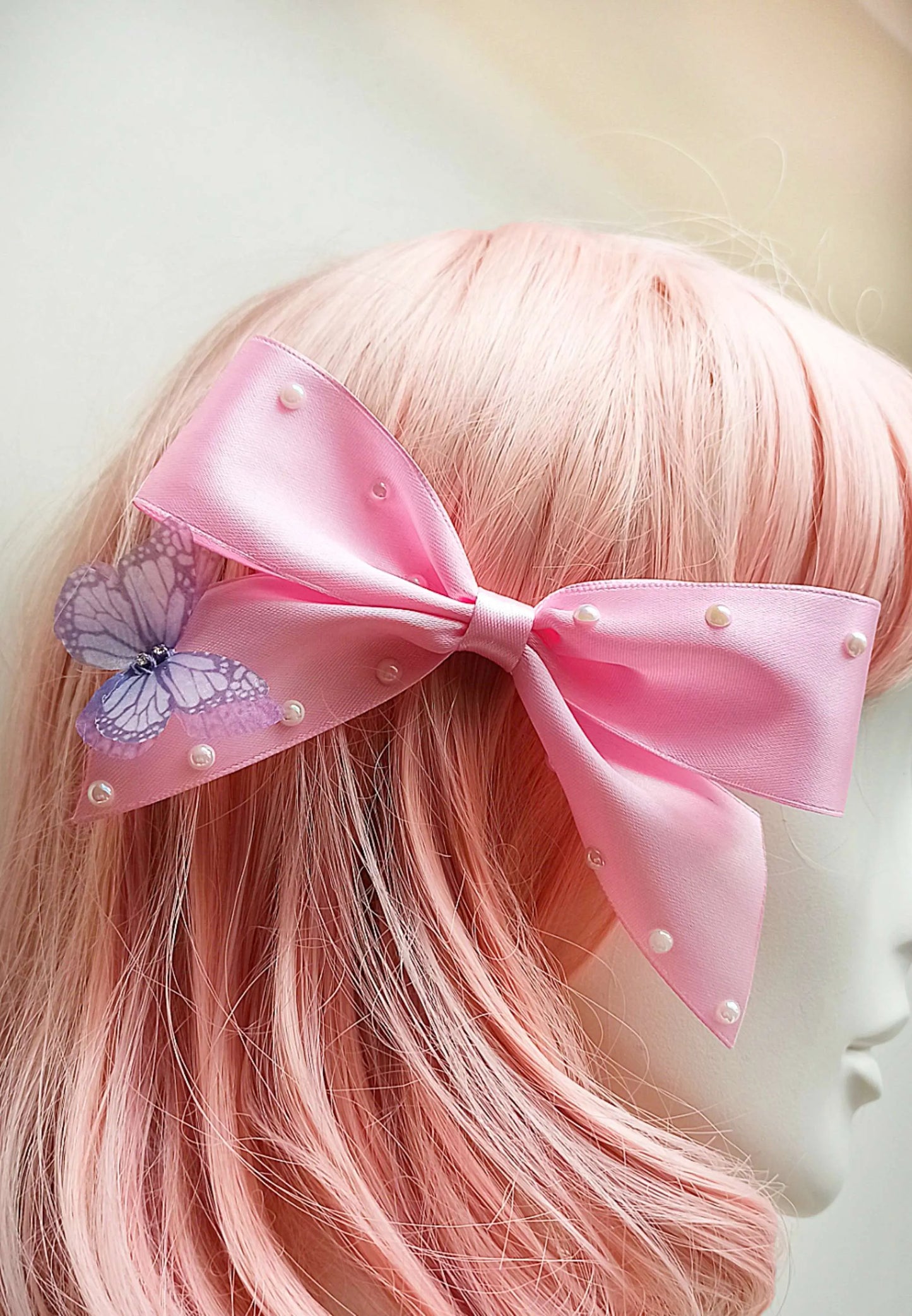 Barrette noeud rose avec perles et papillon fait main